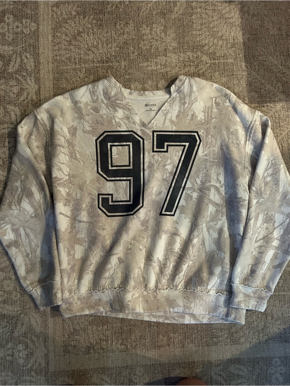 Hollister Women’s Light Gray Camouflage V-Neck Sweatshirt with Black '97 Logo